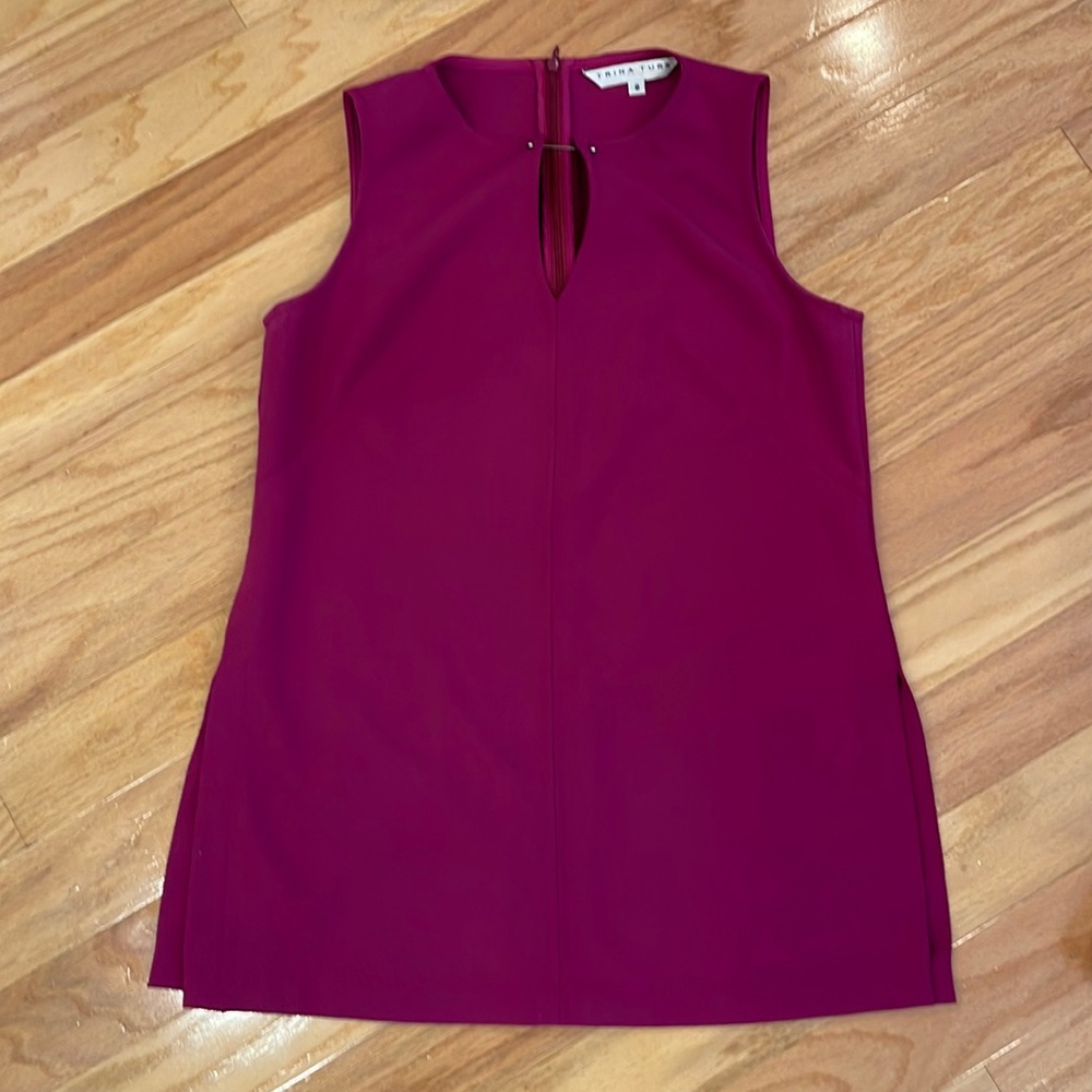 Trina Turk, size 8 sleeveless tunic top with side slits.  In a rich berry color.